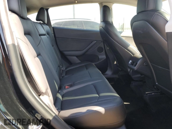 2022 Tesla Model Y Performance with VIN 7SAYGDEF1NF486218, listed as a Copart auction lot 63127435 with 99,302 mi miles and Salvage title. Bid and sale history available at DreamBid. Image 10.