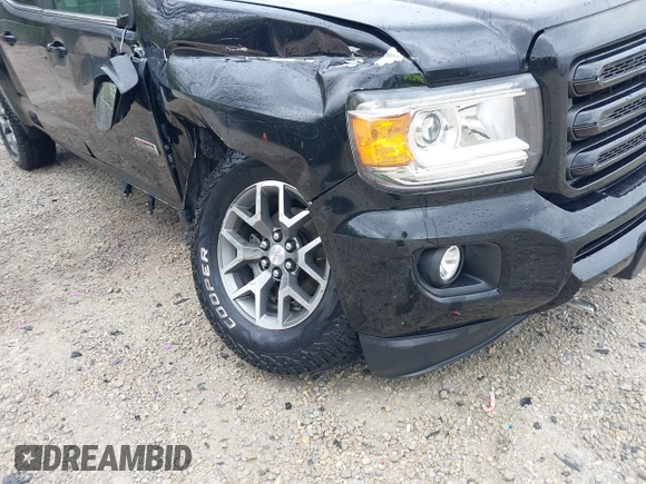 2020 GMC Canyon 4WD All Terrain with VIN 1GTG6FEN8L1181187, listed as a IAAI auction lot 42045207 with 76,249 mi miles and . Bid and sale history available at carsss.com. Image 17.