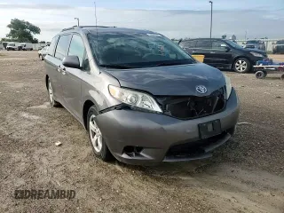 2011 Toyota Sienna LE AAS with VIN 5TDKK3DC7BS171627, listed as a Copart auction lot 64001605 with 130,748 mi miles and Salvage title. Bid and sale history available at DreamBid. Image 14.