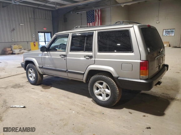2000 Jeep Cherokee Police with VIN 1J4FT48S4YL275891, listed as a Copart auction lot 76065974 with 138,485 mi miles and Salvage Title. Bid and sale history available at carsss.com. Image 2.