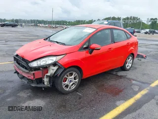 2014 Ford Fiesta SE with VIN 3FADP4BJ7EM205299, listed as a IAAI auction lot 42109032 with 145,797 mi miles. Bid and sale history available at carsss.com. Image 2.