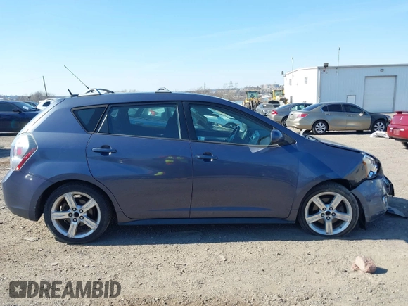 2009 Pontiac Vibe w/1SB with VIN 5Y2SL67059Z423173, listed as a IAAI auction lot 41779483 with 108,896 mi miles. Bid and sale history available at carsss.com. Image 12.