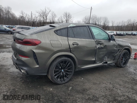2023 BMW X6 xDrive40i z VIN 5UXCY6C03P9P48220, wystawiony jako Copart lot #51660845 z przebiegiem 24 947 mil mil oraz Szkoda całkowita • Salvage title. Historia ofert i sprzedaży dostępna na DreamBid. Obrazek 3.