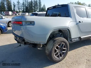 2022 Rivian R1T Adventure Package with VIN 7FCTGAAA5NN007018, listed as a IAAI auction lot 42018939 with 41,991 mi miles. Bid and sale history available at carsss.com. Image 6.