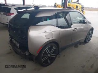 2014 BMW i3 with VIN WBY1Z4C57EV276127, listed as a IAAI auction lot 41531408 with 105,696 mi miles and . Bid and sale history available at DreamBid. Image 4.
