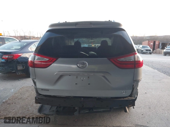 2016 Toyota Sienna LE with VIN 5TDJK3DC4GS133694, listed as a IAAI auction lot 41171171 with 99,680 mi miles. Bid and sale history available at carsss.com. Image 16.