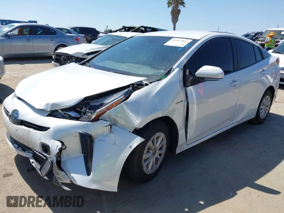2021 Toyota Prius L Eco with VIN JTDKAMFU8M3135142, listed as a IAAI auction lot 42317007 with 77,353 mi miles and . Bid and sale history available at DreamBid. Image 19.