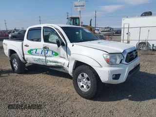 2014 Toyota Tacoma PreRunner with VIN 3TMJU4GN7EM158230, listed as a IAAI auction lot 40010521 with 145,185 mi miles. Bid and sale history available at carsss.com. Image 1.