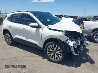 2022 Ford Escape Titanium z VIN 1FMCU9J97NUB89504, wystawiony jako IAAI lot #42571833 z przebiegiem Nie podano mil oraz . Historia ofert i sprzedaży dostępna na DreamBid. Obrazek 1.