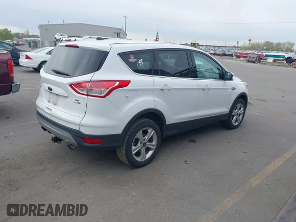 2013 Ford Escape SE with VIN 1FMCU9G98DUD55700, listed as a IAAI auction lot 42035531 with 189,010 mi miles. Bid and sale history available at carsss.com. Image 4.
