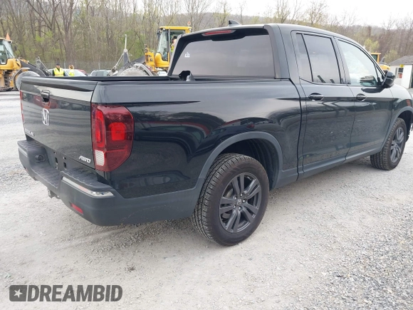 2019 Honda Ridgeline Sport with VIN 5FPYK3F10KB046552, listed as a IAAI auction lot 41983384 with 77,229 mi miles and . Bid and sale history available at DreamBid. Image 4.