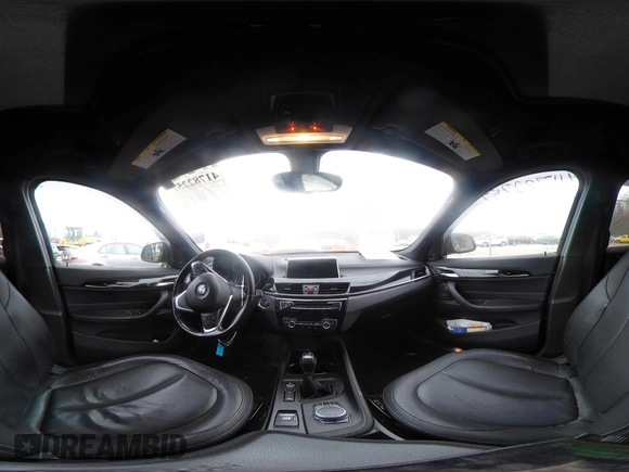 2017 BMW X1 xDrive28i with VIN WBXHT3C31H5F72958, listed as a IAAI auction lot 41782257 with 134,829 mi miles. Bid and sale history available at carsss.com. Image 18.
