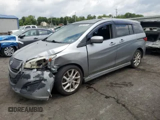 2012 Mazda 5 Touring с VIN JM1CW2CL0C0134136, выставлен на аукционе Copart как лот 65427675 с пробегом 187 721 миль миль и Списание • Salvage title. История ставок и продаж доступна на DreamBid. Изображение 1.