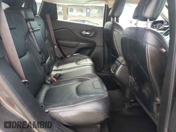 2014 Jeep Cherokee Trailhawk with VIN 1C4PJMBS6EW140981, listed as a Copart auction lot 58260325 with 97,036 mi miles and Salvage title. Bid and sale history available at DreamBid. Image 11.