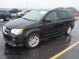 2015 Dodge Grand Caravan SXT with VIN 2C4RDGCG8FR556861, listed as a IAAI auction lot 42224948 with 110,797 mi miles and . Bid and sale history available at DreamBid. Image 2.