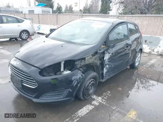 2016 Ford Fiesta SE with VIN 3FADP4EJ1GM143798, listed as a IAAI auction lot 41588665 with 97,938 mi miles. Bid and sale history available at carsss.com. Image 2.