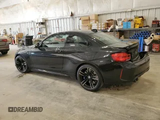 2018 BMW M2 z VIN WBS1J5C51J7B70216, wystawiony jako Copart lot #54983755 z przebiegiem 80 398 mil mil oraz Tytuł czysty. Historia ofert i sprzedaży dostępna na DreamBid. Obrazek 2.
