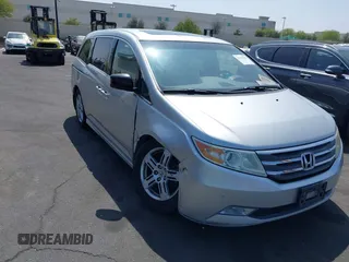 2012 Honda Odyssey Touring с VIN 5FNRL5H91CB004546, выставлен на аукционе IAAI как лот 42175002 с пробегом 118 719 миль миль и . История ставок и продаж доступна на DreamBid. Изображение 1.