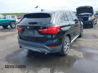 2017 BMW X1 sDrive28i with VIN WBXHU7C3XHP924635, listed as a IAAI auction lot 41744824 with 74,143 mi miles. Bid and sale history available at carsss.com. Image 4.