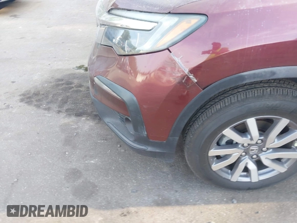 2019 Honda Pilot EX-L z VIN 5FNYF5H5XKB045563, wystawiony jako IAAI lot #42329311 z przebiegiem 46 903 mil mil oraz . Historia ofert i sprzedaży dostępna na DreamBid. Obrazek 6.