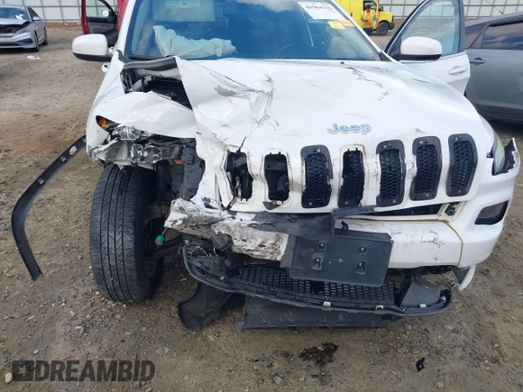 2016 Jeep Cherokee Latitude with VIN 1C4PJMCS5GW148829, listed as a IAAI auction lot 41964335 with 99,741 mi miles. Bid and sale history available at carsss.com. Image 6.