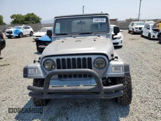 2001 Jeep Wrangler Sport с VIN 1J4FA49S41P353878, выставлен на аукционе Copart как лот 64637385 с пробегом 166 642 миль миль и Списание • Salvage title. История ставок и продаж доступна на DreamBid. Изображение 5.