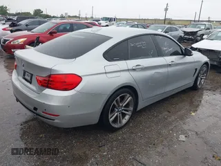 2015 BMW 4 Series 428i with VIN WBA4A9C50FD416459, listed as a IAAI auction lot 42471985 with 160,089 mi miles and . Bid and sale history available at DreamBid. Image 4.