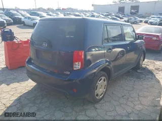 2014 Scion xB with VIN JTLZE4FE0EJ057503, listed as a IAAI auction lot 41994777 with 197,184 mi miles. Bid and sale history available at carsss.com. Image 4.