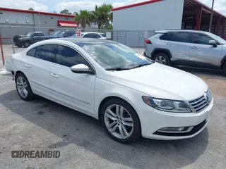 2014 Volkswagen CC Executive z VIN WVWRP7AN7EE537318, wystawiony jako IAAI lot #42308532 z przebiegiem 217 059 mil mil oraz . Historia ofert i sprzedaży dostępna na DreamBid. Obrazek 1.
