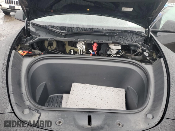 2022 Tesla Model Y Performance z VIN 7SAYGDEF9NF382883, wystawiony jako Copart lot #52028085 z przebiegiem 49 108 mil mil oraz Szkoda całkowita • Salvage title. Historia ofert i sprzedaży dostępna na DreamBid. Obrazek 11.