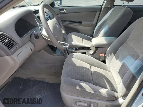 2005 Toyota Camry LE with VIN 4T1BE30K35U603940, listed as a Copart auction lot 61404235 with 203,294 mi miles and Salvage title. Bid and sale history available at DreamBid. Image 7.