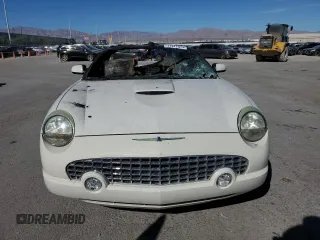 2003 Ford Thunderbird Deluxe z VIN 1FAHP60A83Y113992, wystawiony jako Copart lot #77277574 z przebiegiem Nie podano mil oraz Nie do naprawy • Non repairable. Historia ofert i sprzedaży dostępna na DreamBid. Obrazek 5.