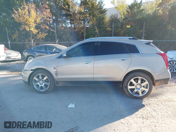 2011 Cadillac SRX Performance Collection with VIN 3GYFNBEY3BS529406, listed as a IAAI auction lot 40926089 with 160,535 mi miles. Bid and sale history available at carsss.com. Image 14.