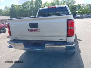 2014 GMC Sierra 1500 SLT with VIN 3GTU2VEC5EG548784, listed as a IAAI auction lot 42156738 with 118,809 mi miles and . Bid and sale history available at DreamBid. Image 16.