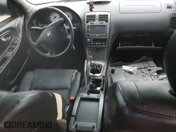 2002 Nissan Maxima GXE z VIN JN1DA31D42T427865, wystawiony jako Copart lot #74374134 z przebiegiem Nie podano mil oraz Szkoda całkowita • Salvage title. Historia ofert i sprzedaży dostępna na DreamBid. Obrazek 8.