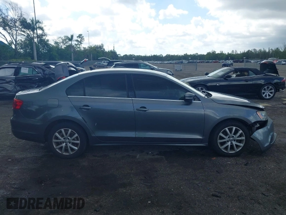 2014 Volkswagen Jetta SE with VIN 3VWD07AJ9EM277085, listed as a IAAI auction lot 42531957 with 171,613 mi miles and . Bid and sale history available at DreamBid. Image 14.