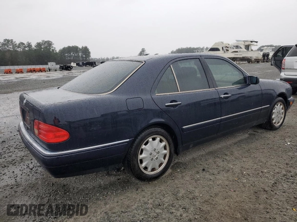 1997 Mercedes-Benz E-Class with VIN WDBJF55FXVJ027722, listed as a Copart auction lot 44835585 with 0 mi miles and Salvage Title. Bid and sale history available at carsss.com. Image 3.