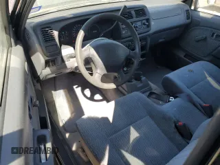 1999 Nissan Frontier XE with VIN 1N6DD26S6XC327079, listed as a Copart auction lot 49295335 with 170,753 mi miles and Salvage title. Bid and sale history available at DreamBid. Image 8.