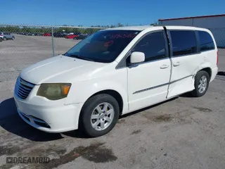 2012 Chrysler Town & Country Touring with VIN 2C4RC1BG7CR127353, listed as a IAAI auction lot 41805827 with 1 mi miles. Bid and sale history available at carsss.com. Image 2.
