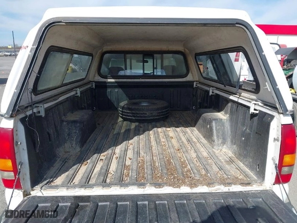 1999 Chevrolet Silverado 1500 with VIN 1GCEC14W2XE158287, listed as a IAAI auction lot 41829042 with 261,504 mi miles. Bid and sale history available at carsss.com. Image 8.
