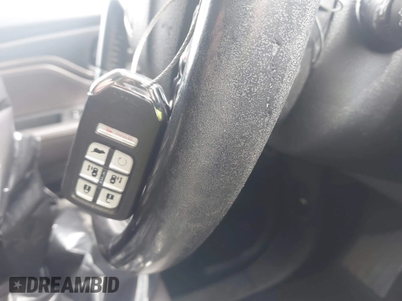 2018 Honda Odyssey EX-L z VIN 5FNRL6H74JB031306, wystawiony jako IAAI lot #41603478 z przebiegiem Nie podano mil oraz . Historia ofert i sprzedaży dostępna na DreamBid. Obrazek 11.
