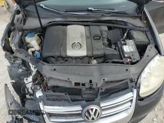 2009 Volkswagen Jetta S z VIN 3VWJM71K49M094862, wystawiony jako Copart lot #51166725 z przebiegiem 121 849 mil mil oraz Szkoda całkowita • Salvage title. Historia ofert i sprzedaży dostępna na DreamBid. Obrazek 11.