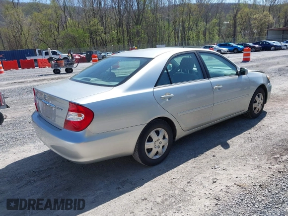 2004 Toyota Camry LE with VIN 4T1BE30K14U290983, listed as a IAAI auction lot 41983078 with 174,852 mi miles and . Bid and sale history available at carsss.com. Image 4.