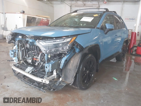 2022 Toyota RAV4 Hybrid SE with VIN 4T3T6RFV3NU089343, listed as a IAAI auction lot 41223554 with 50,589 mi miles and . Bid and sale history available at DreamBid. Image 2.
