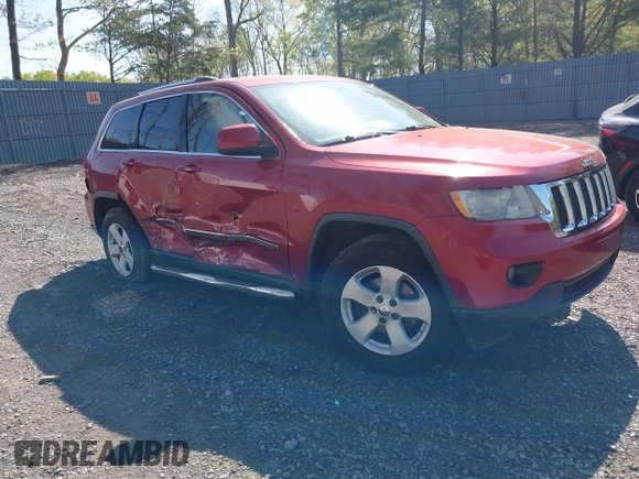 2011 Jeep Grand Cherokee Laredo with VIN 1J4RR4GG5BC512095, listed as a IAAI auction lot 42156490 with 160,749 mi miles. Bid and sale history available at carsss.com. Image 1.