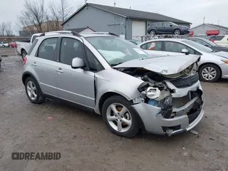 2007 Suzuki SX4 Man Touring Pkg AWD with VIN JS2YB417475102405, listed as a IAAI auction lot 41106931 with 170,315 mi miles. Bid and sale history available at carsss.com. Image 1.