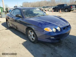 2001 Hyundai Tiburon with VIN KMHJG25F11U261457, listed as a Copart auction lot 43012635 with 165,625 mi miles and Salvage Title. Bid and sale history available at carsss.com. Image 4.