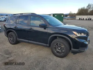 2023 Honda Pilot TrailSport with VIN 5FNYG1H63PB017335, listed as a Copart auction lot 75012154 with 5,870 mi miles and Salvage Title. Bid and sale history available at carsss.com. Image 4.