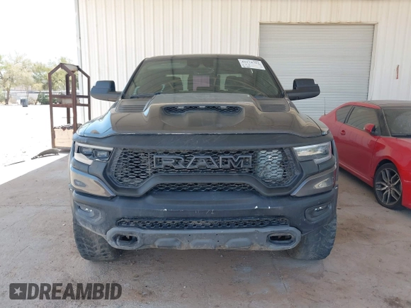 2022 Ram 1500 TRX with VIN 1C6SRFU97NN353587, listed as a IAAI auction lot 42174702 with 35,305 mi miles and . Bid and sale history available at DreamBid. Image 13.