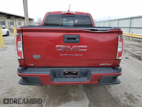 2021 GMC Canyon 4WD AT4 w/Cloth with VIN 1GTG6FENXM1185842, listed as a Copart auction lot 52574755 with 47,322 mi miles and Salvage Title. Bid and sale history available at carsss.com. Image 6.